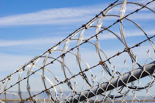 Razor barbed wire security fence, California